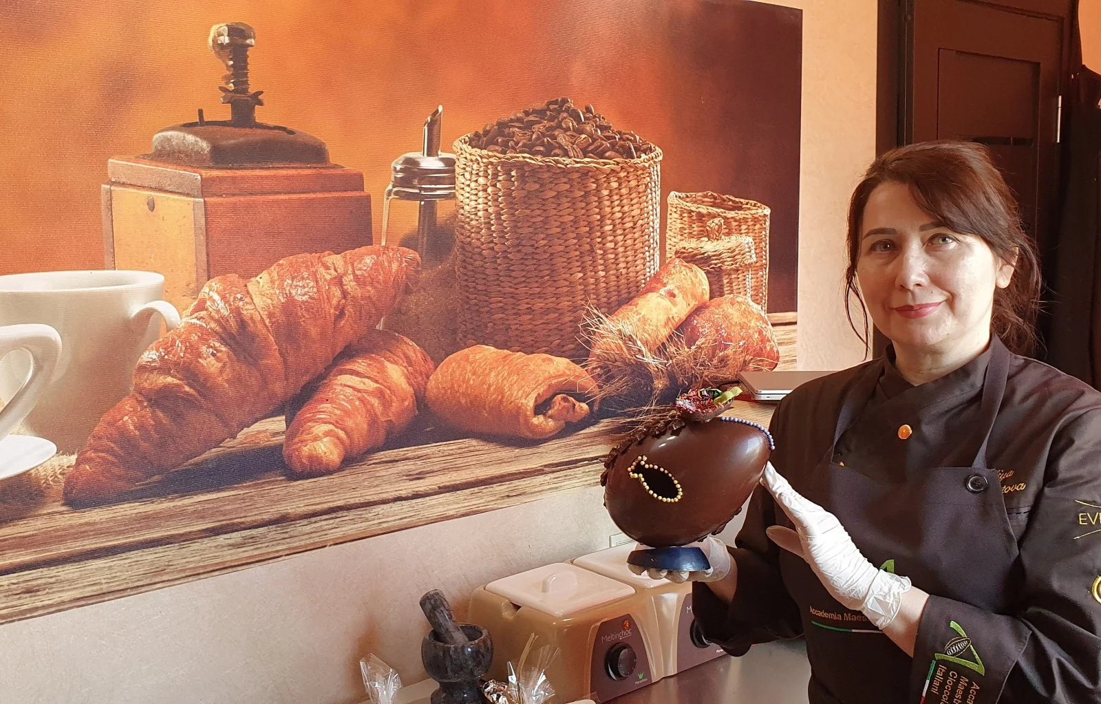 Liliya crafting chocolate in her workshop